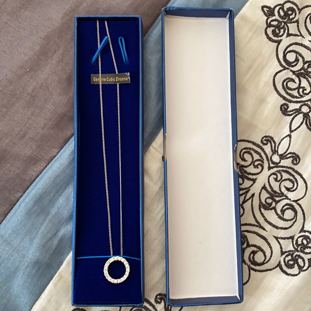 17” Necklace with circle pendant.  Cubic Zirconia. New in gift box!